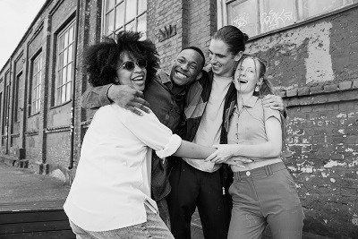 front-view-smiley-people-posing-together